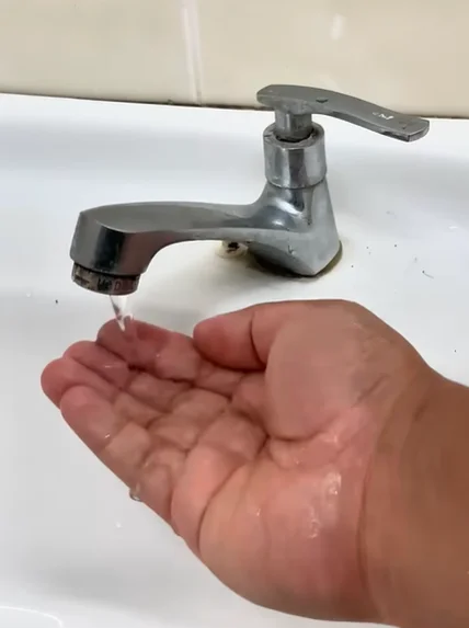 Weak water pressure at a tap in a Multan home