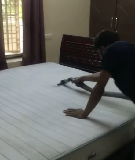 Mattress cleaning service by UrbanFix technician in Multan